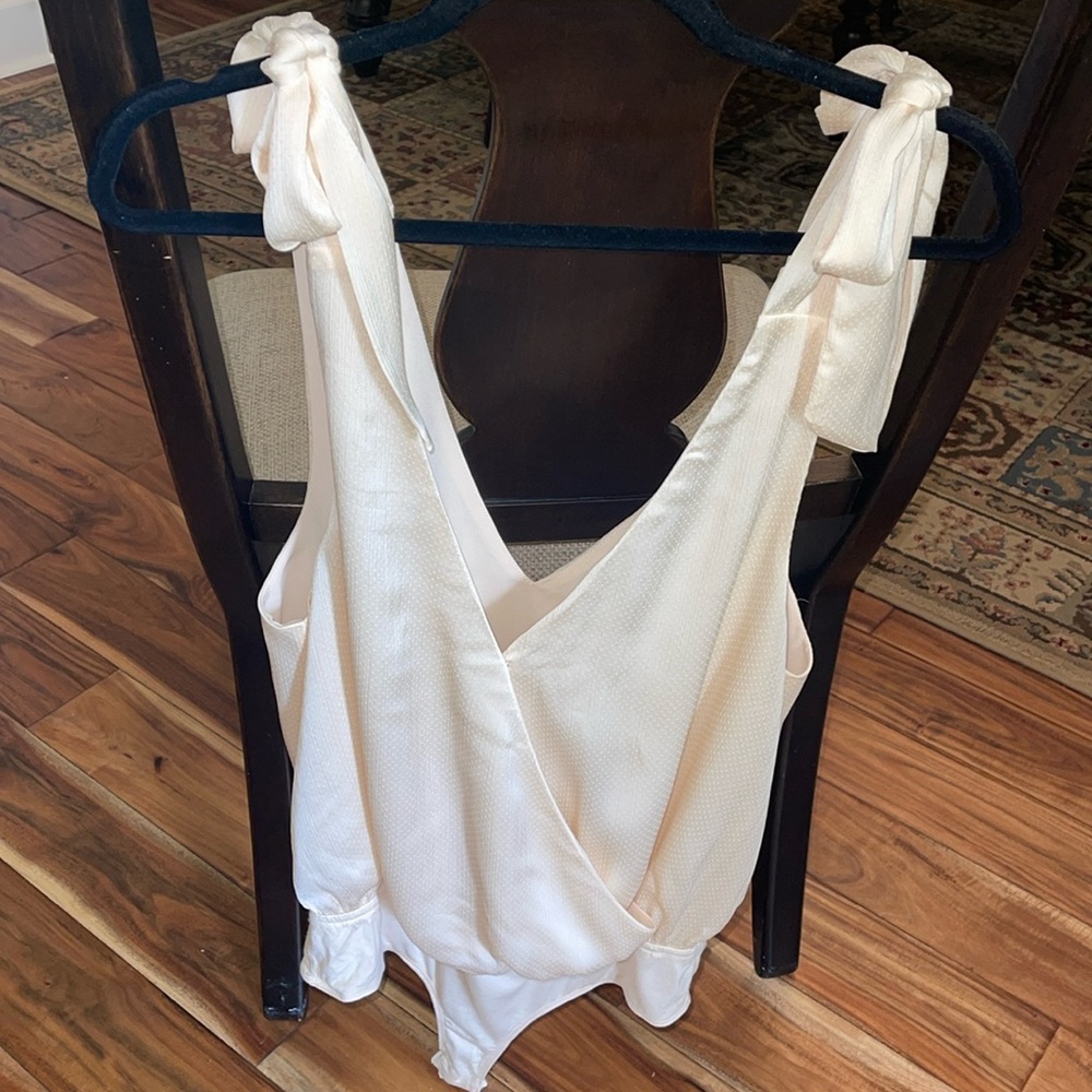 LE LIS cream sleeveless tie bodysuit, size M-tags removed, but never worn.